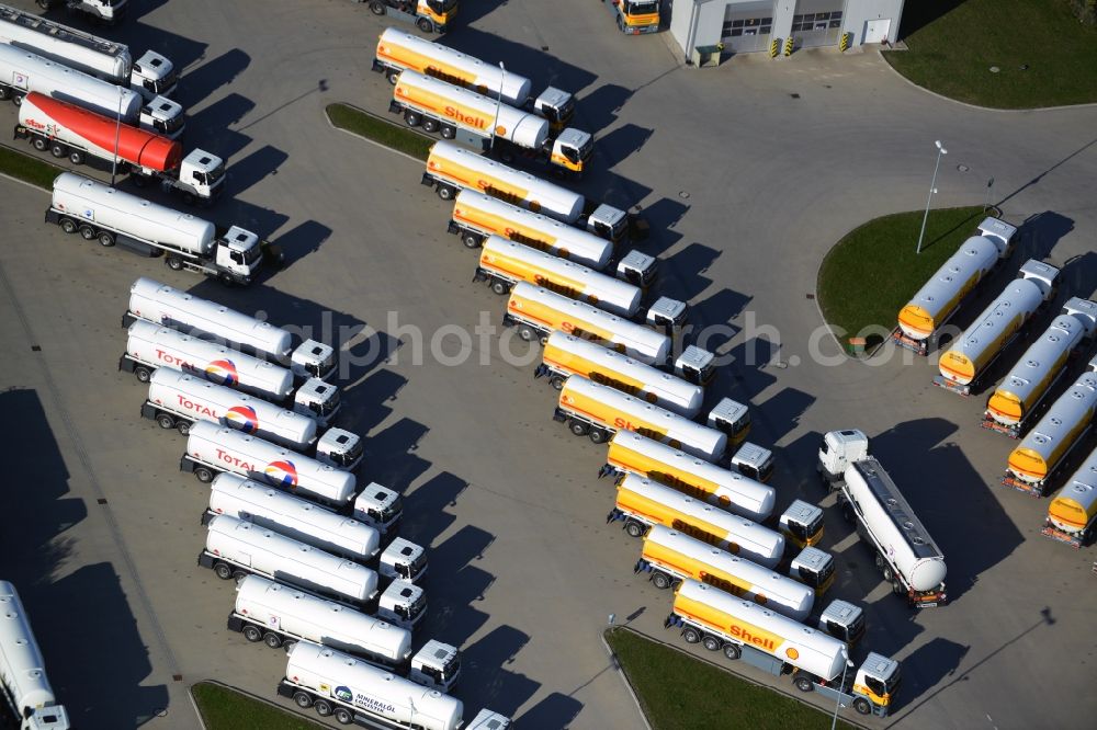 Aerial photograph Seefeld - Automotive parking- space with rows of parked truck tankers in Seefeld in Brandenburg