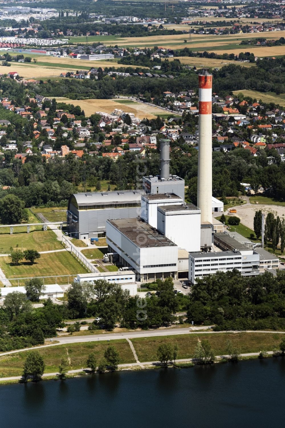 Wien from above - Power plants and exhaust towers of thermal power station KWK-Kraftwek Donaustadt in Vienna in Austria