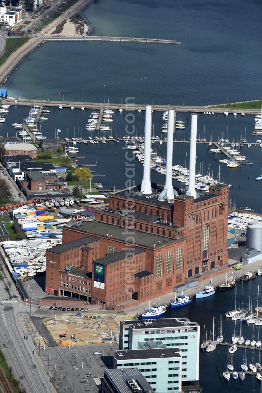Kopenhagen from above - Power plants and exhaust towers of thermal power station Svanemollevaerket Lautrupsgade in Copenhagen in Region Hovedstaden, Denmark