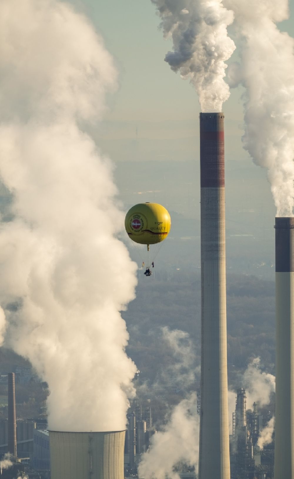 Aerial image Gelsenkirchen - Yellow hot air balloon with the identification D-OWNT in front of the exhaust gas clouds of the power plants and exhaust towers of thermal power station of Uniper Kraftwerke GmbH in the district Gelsenkirchen-Nord in Gelsenkirchen in the state North Rhine-Westphalia