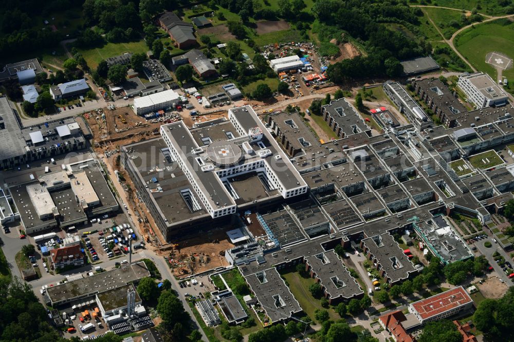 Lübeck from the bird's eye view: Construction site for a new extension to the hospital grounds UKSH Universitaetsklinikum Schleswig-Holstein in the district St. Juergen in Luebeck in the state Schleswig-Holstein, Germany