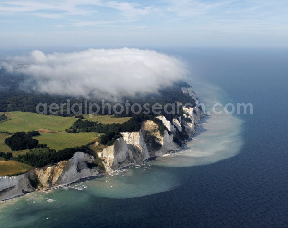 Aerial photograph Borre - Chalk cliffs of Møns Klint in Borre on the island Moen in Denmark. The clouds over the forest are considered rare natural spectacle that so occurs only in the boundary between land and water
