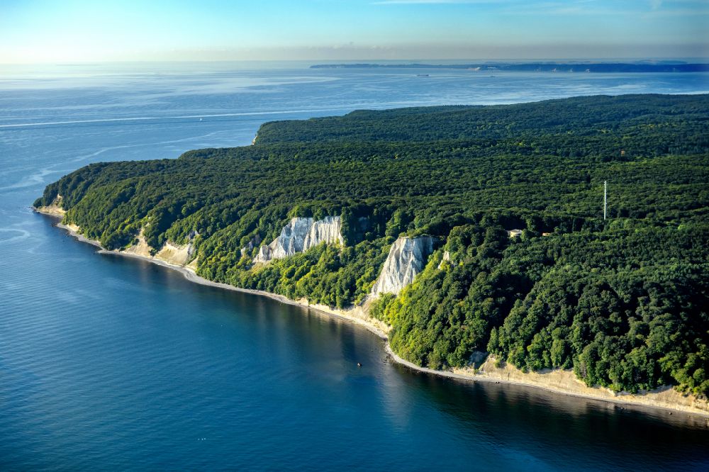 Stubbenkammer from the bird's eye view: Wooded chalk cliffs and cliff landscape in the Jasmund National Park on the cliffs on the Baltic Sea in Stubbenkammer on the island of Ruegen in the state Mecklenburg-West Pomerania, Germany