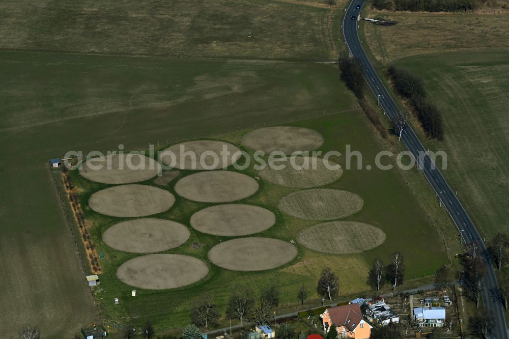 Aerial photograph Eiche - Circular round arch of irrigation system on agricultural fields Bauerngarten Ahrensfelde in Eiche in the state Brandenburg, Germany