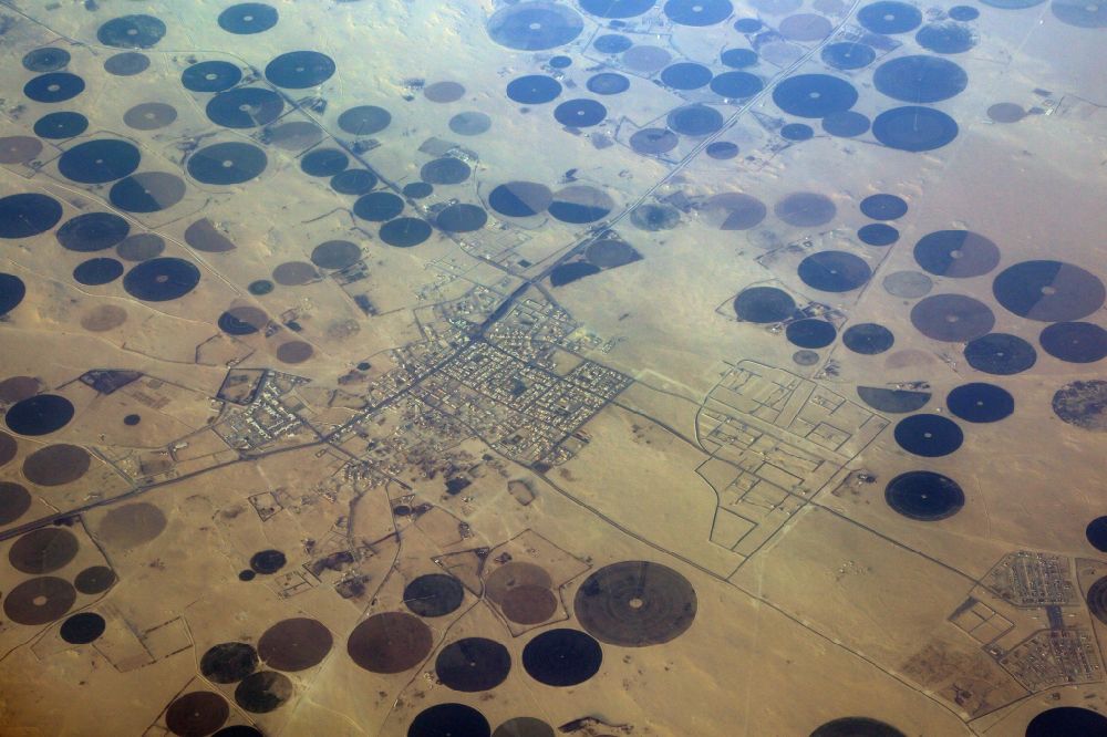 Aerial photograph Qaryat Al Ulya - Desert landscape with artificial irrigation circles at Qaryat Al Ulya in Eastern Province, Saudi-Arabia