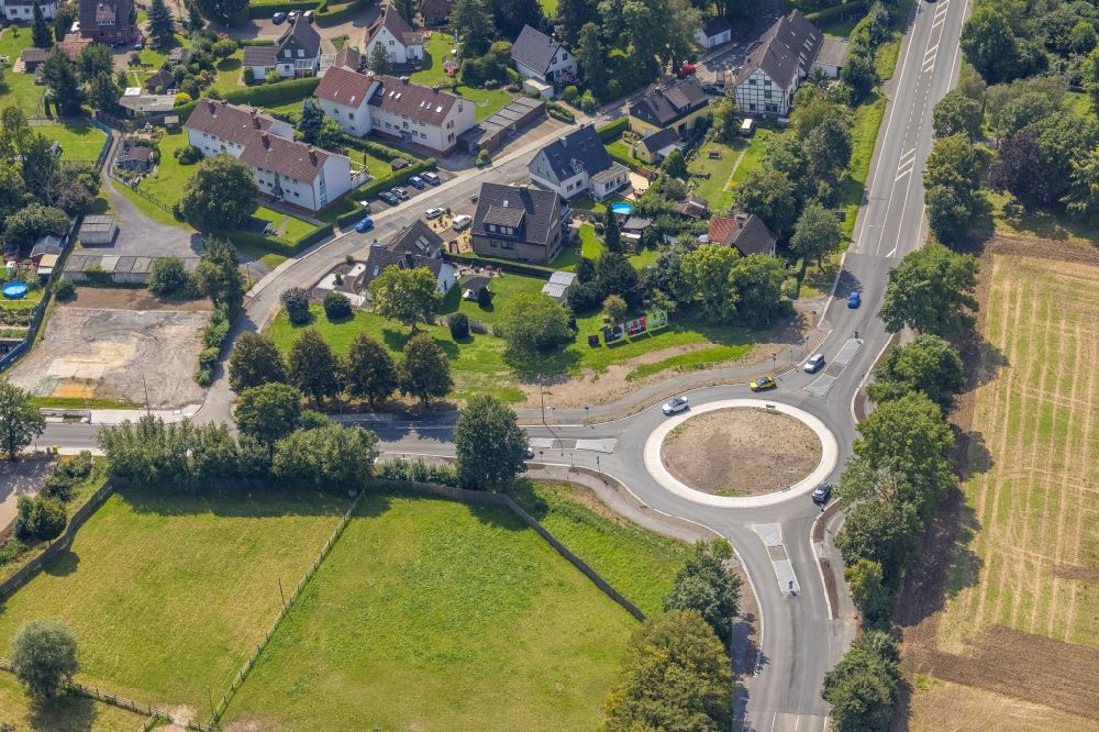 Bönen from the bird's eye view: Traffic management of the roundabout road of Hammer Strasse - Bahnhofstrasse in the district Nordboegge in Boenen in the state North Rhine-Westphalia, Germany