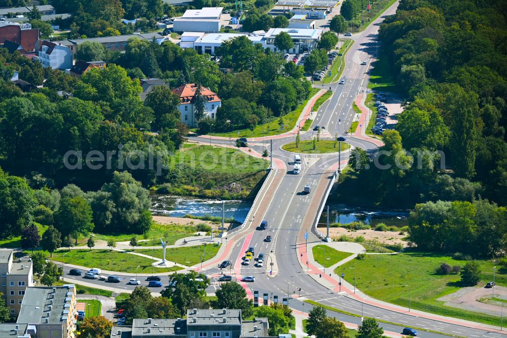 Aerial photograph Dessau - Traffic management of the roundabout road Oranienbaumer Chaussee - Wasserstadt - Friedensbruecke in Dessau in the state Saxony-Anhalt, Germany