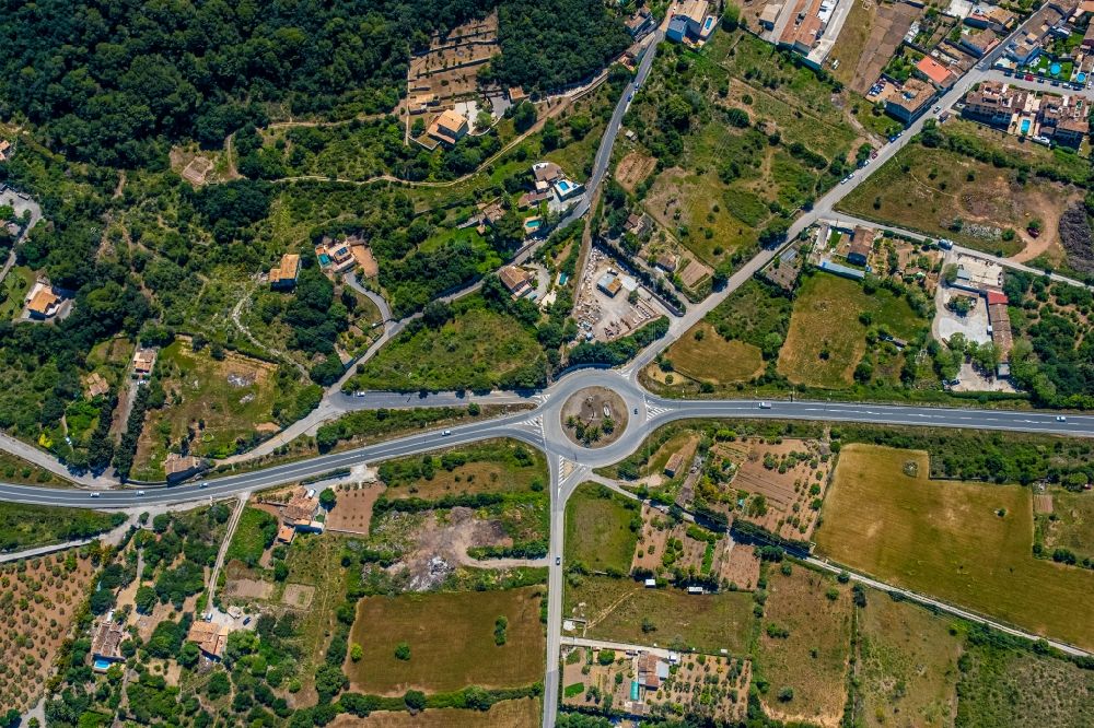 Aerial photograph Capdepera - Traffic management of the roundabout road of the roads of Ma-15 - Carrer Nord - Carrer Major in Capdepera in Balearische Insel Mallorca, Spain