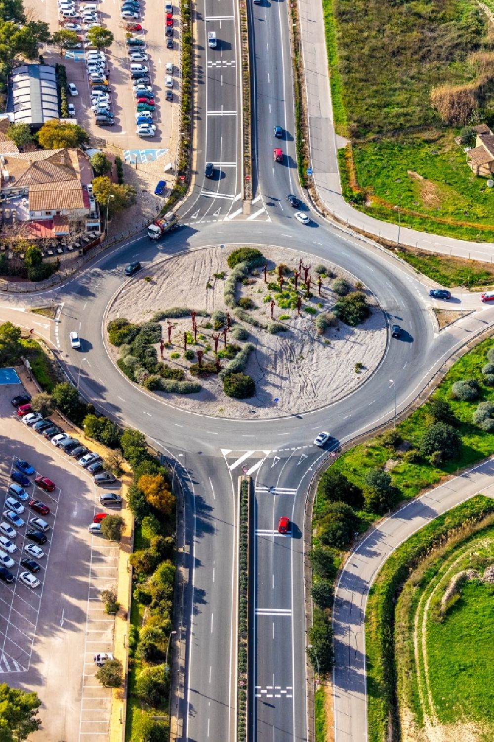 Vilafranca de Bonany from above - Traffic management of the roundabout road of the Ma-15 - Ma-3310 - Ma-5110 in Vilafranca de Bonany in Balearische Insel Mallorca, Spain