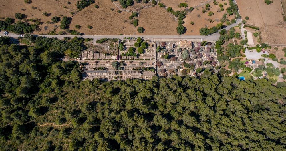 Aerial image Pollensa - Crematory and funeral hall for burial in the grounds of the cemetery Cementiri Municipal de Pollenca in Pollensa in Balearic island of Mallorca, Spain