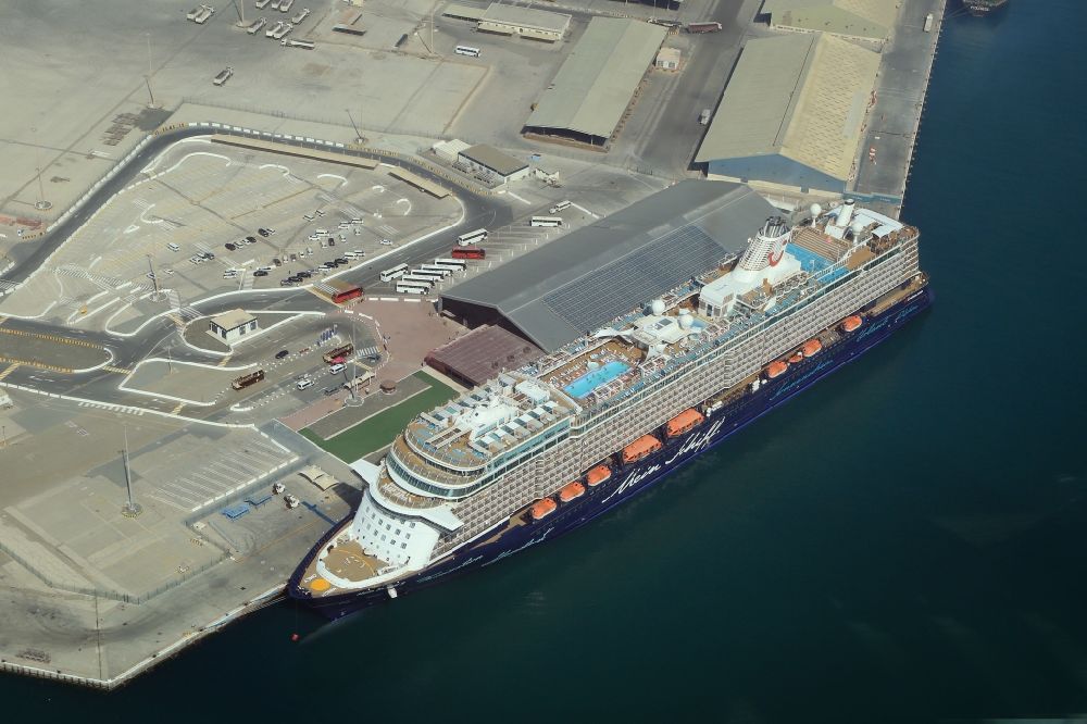 Aerial image Abu Dhabi - Cruise and passenger ship Mein Schiff 5 in Port Zayed in Abu Dhabi in United Arab Emirates