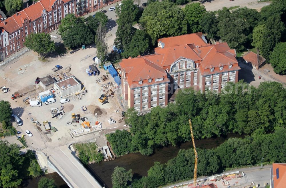 Erfurt from the bird's eye view: Construction site to remodel the course of the intersection Karlstrasse corner Adalbertstrasse in the district Andreasvorstadt in Erfurt in the state Thuringia, Germany