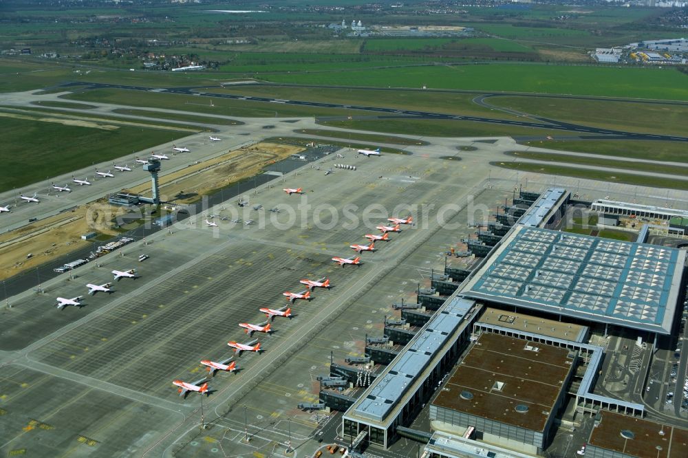 Schönefeld from the bird's eye view: Decommissioned due to crisis passenger airplanes of the airline easyJet in parking position - parking area at the airport in Schoenefeld in the state Brandenburg, Germany
