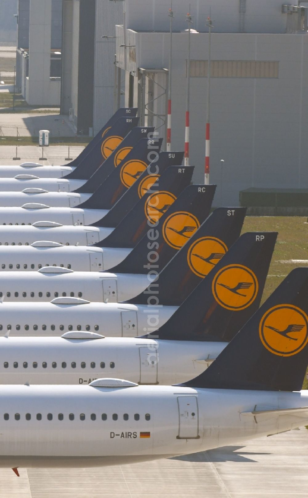 Aerial image Selchow - Decommissioned due to crisis passenger airplanes of the airline Lufthansa in parking position - parking area at the BER - airport in Schoenefeld in the state Brandenburg, Germany