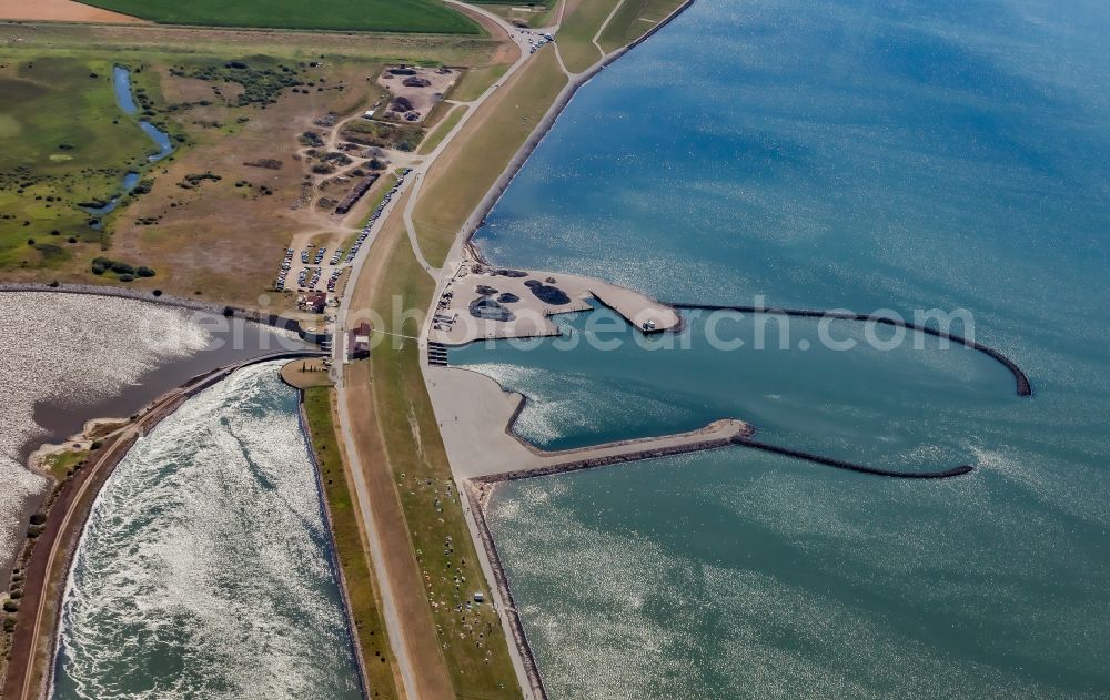 Nordstrand from above - Coastal landscape with dike protection strip and lock in Nordstrand in the state Schleswig-Holstein, Germany