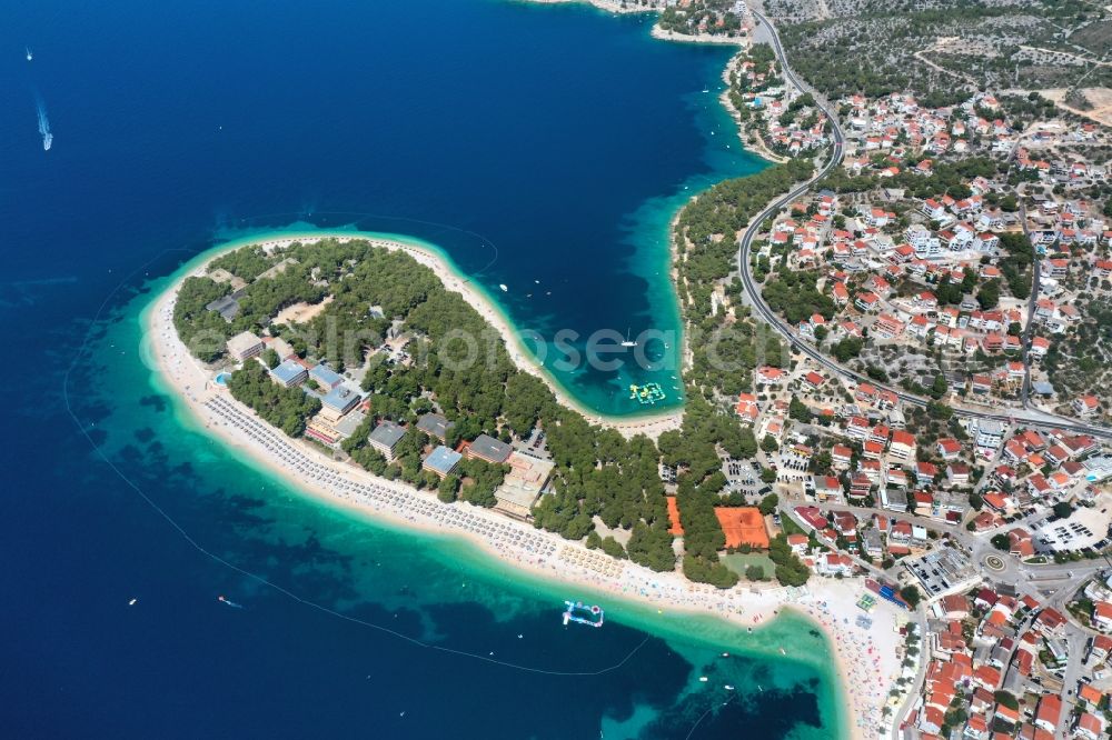 Primosten from the bird's eye view: Coastline on the sandy beach of Adriatic Sea in Primosten in Sibensko-kninska zupanija, Croatia