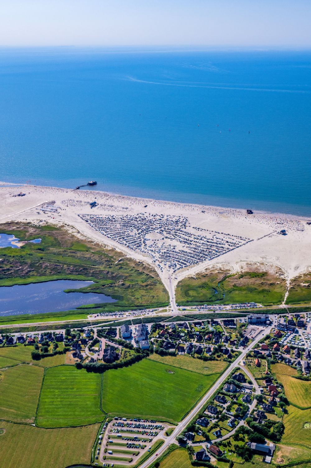 Sankt Peter-Ording from above - Coastal landscape on the sandy beach of the bathing area Ording Nord in the district St Peter-Ording in Sankt Peter-Ording in the state Schleswig-Holstein, Germany