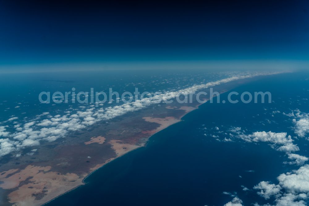 Aerial image Baraawe - Coastline on the sandy beach Indian Ocean in Baraawe in Shabeellaha Hoose, Somalia