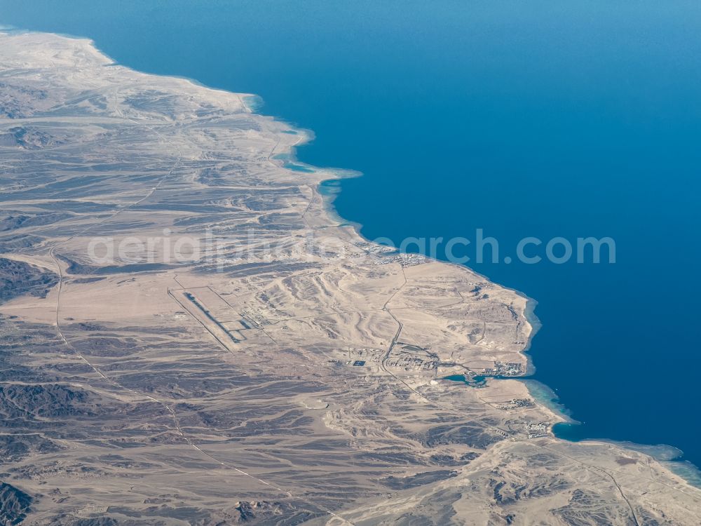 Port Ghalib from above - Coastline on the sandy beach Marsa Alam on street Unnamed Road in Port Ghalib in Red Sea Governorate, Egypt