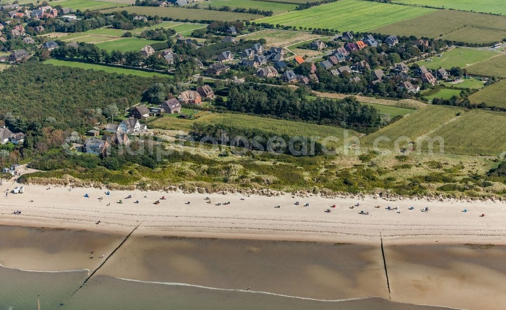 Aerial photograph Utersum - Coastal landscape on the sandy beach of the North Sea in Utersum on the island of Foehr in the state Schleswig-Holstein, Germany