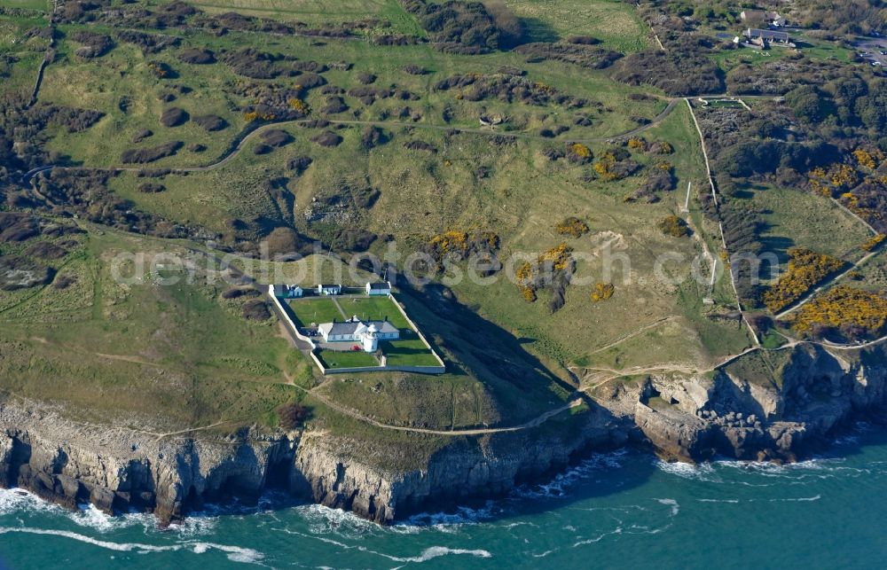 Anvil Point Lighthouse from above - Coastline on Durlston Country Park and National Nature Reserve on Lighthouse Rd at the rocky cliffs of of English Channel Anvil Point Lighthouse in Swanage in England, United Kingdom