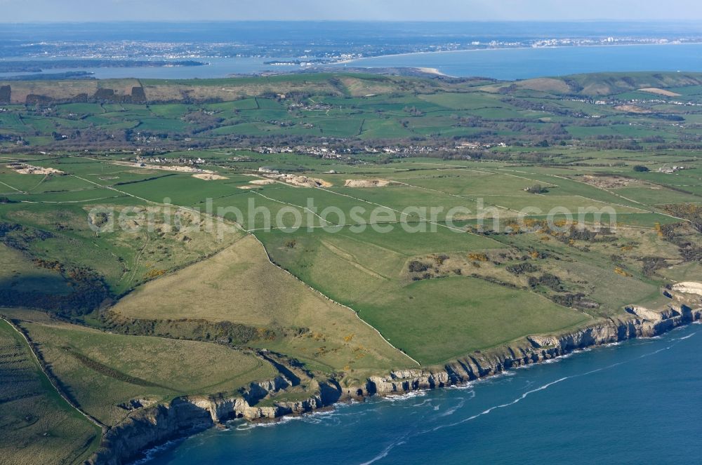 Swanage from the bird's eye view: Coastline at the rocky cliffs of on the English Channel in Swanage in England, United Kingdom