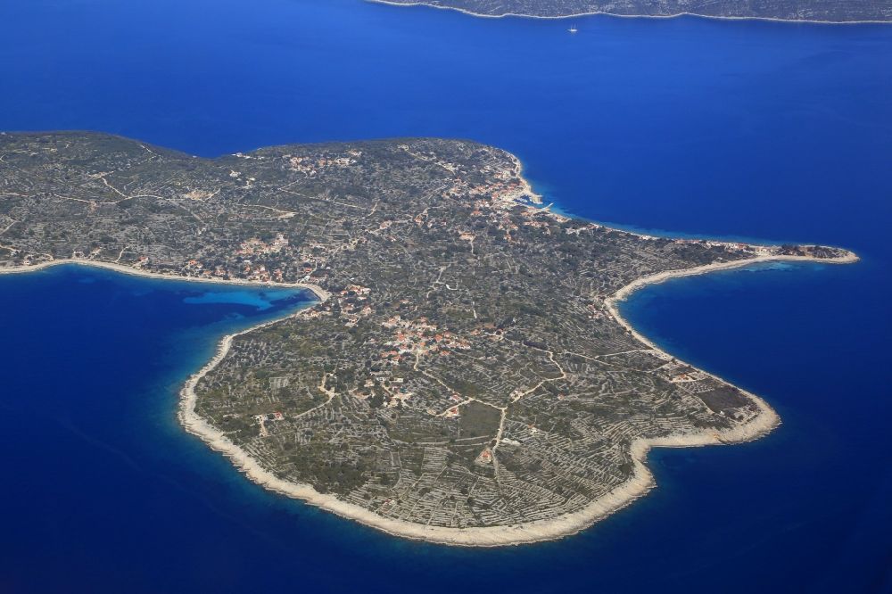 Aerial image Drvenik Mali - Coastal area Adriatic Sea - Island in Drvenik Mali in Splitsko-dalmatinska zupanija, Croatia