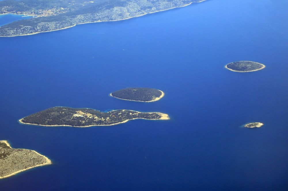 Aerial image Zlarin - Coastal area and Mediterranean Sea island Otok Obanjan at the Adriatic Sea in Zlarin in Sibensko-kninska zupanija, Croatia