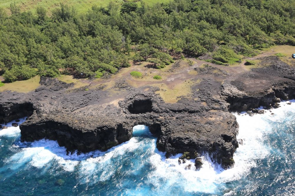Souffleur from above - Typical rocky coast at Souffleur on the south coast of the island Mauritius in the Indian Ocean. Cave and bridge in tne rock Formation
