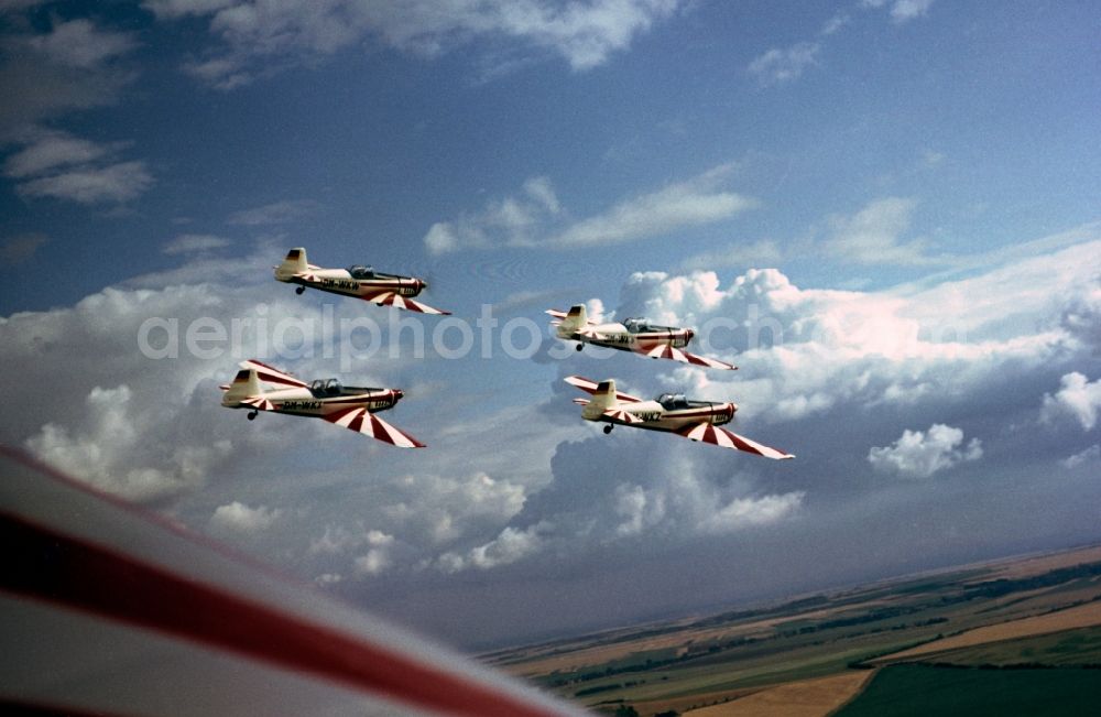 Aerial photograph Hecklingen Cochstedt - The world aerobatic championship season of the GDR Zlin Z-526 A acrobat, a Czechoslovakian sport and aerobatic aircraft of Trener series, at the 5th World Championship Aerobatic of 18 - 31.08.1968 on the airfield Magdeburg / Cochstedt in Saxony-Anhalt