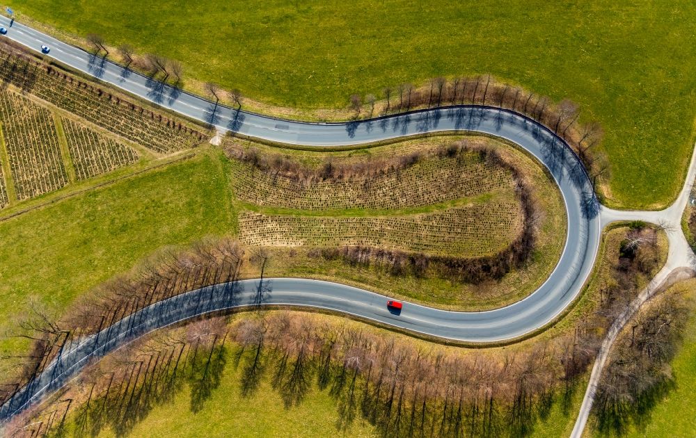 Aerial photograph Olsberg - A serpentine curve of a road layout north of Olsberg in the state of North Rhine-Westphalia, Germany