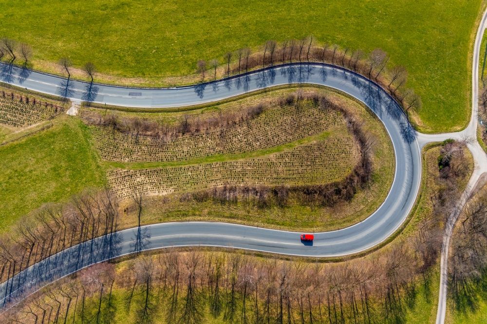 Olsberg from the bird's eye view: A serpentine curve of a road layout north of Olsberg in the state of North Rhine-Westphalia, Germany