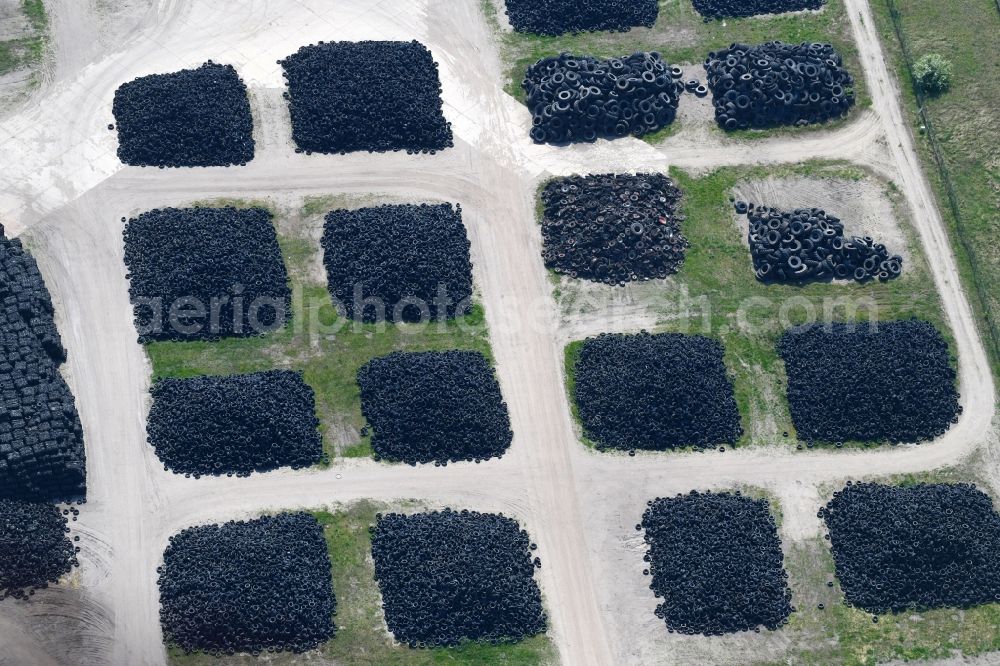 Aerial photograph Oranienburg - Bearing surface for old tires on the premises of GENAN GmbH on Birkenallee in the industrial area in Oranienburg in the state Brandenburg, Germany