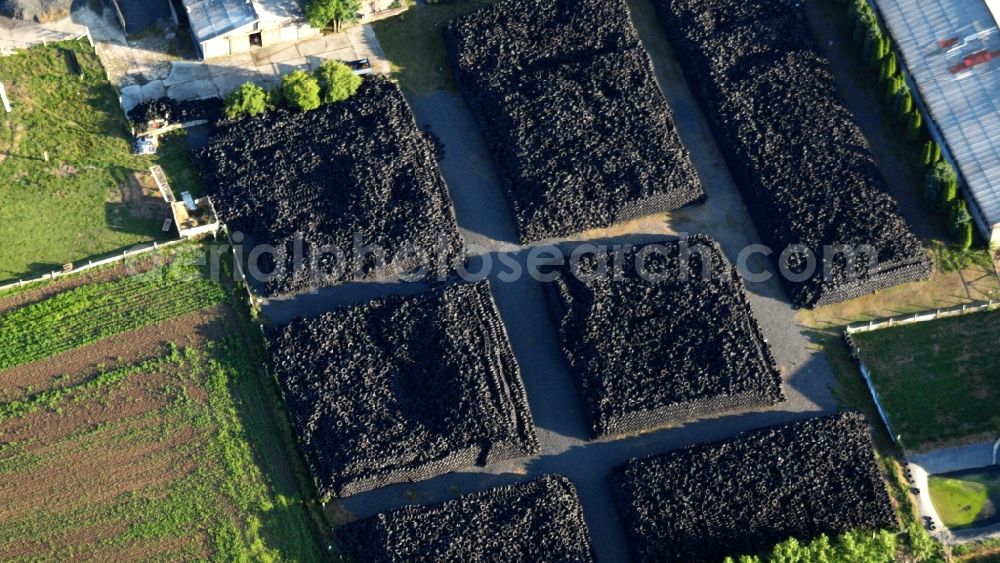Aerial image Osterwieck - Bearing surface for used tires in the industrial area in Osterwieck in the state Saxony-Anhalt, Germany
