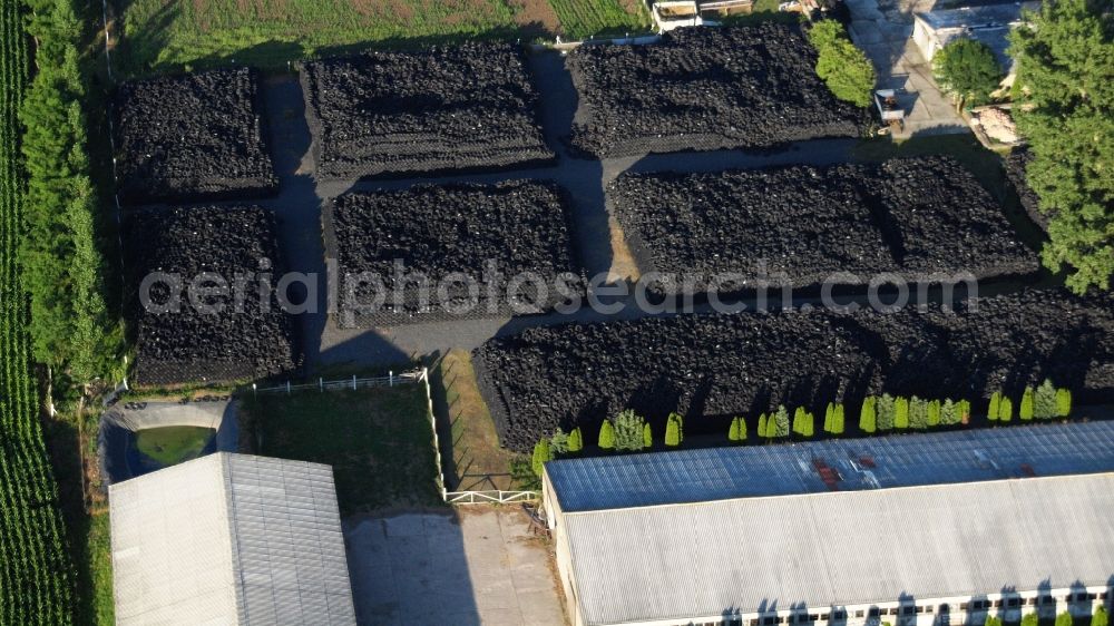 Osterwieck from the bird's eye view: Bearing surface for used tires in the industrial area in Osterwieck in the state Saxony-Anhalt, Germany