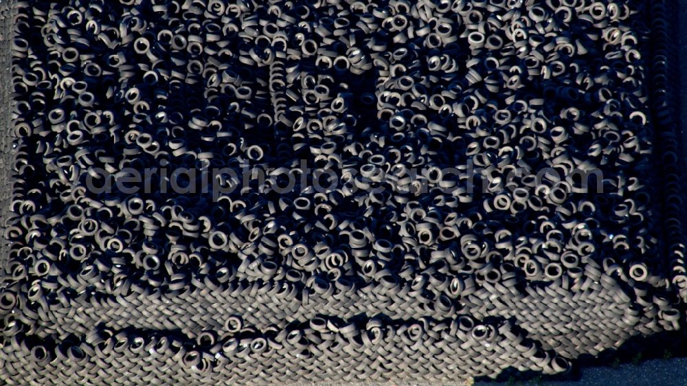 Aerial photograph Osterwieck - Bearing surface for used tires in the industrial area in Osterwieck in the state Saxony-Anhalt, Germany