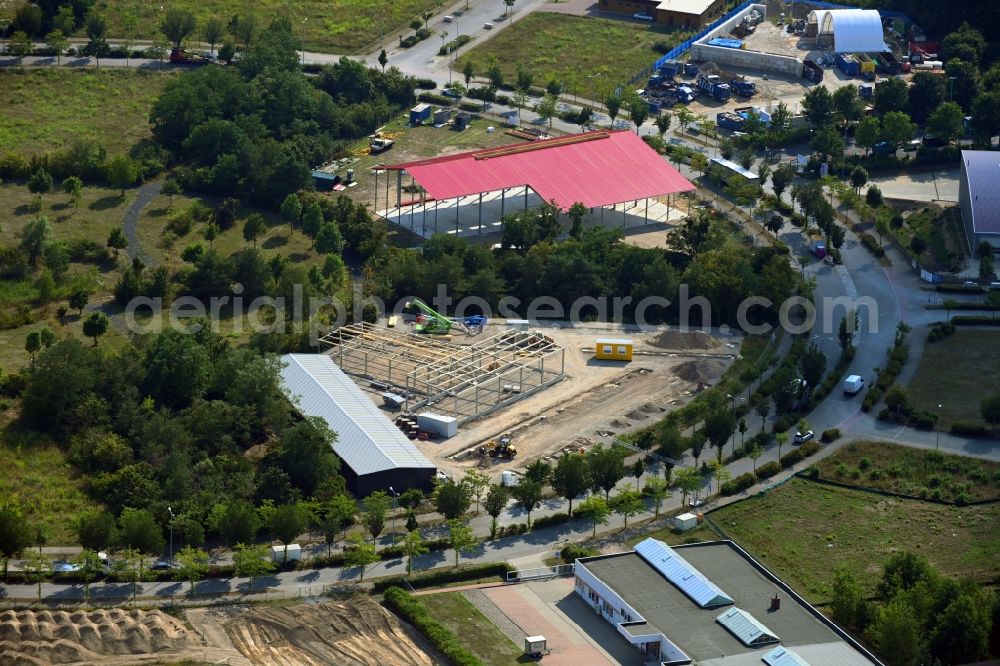 Ludwigsfelde from the bird's eye view: Construction site for the new construction of a self-storage warehouse on Loewenbrucher Ring in Preussenpark in Ludwigsfelde in the state Brandenburg, Germany