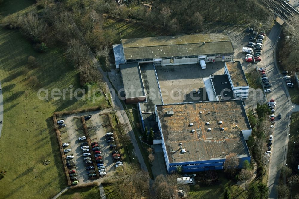 Mühlenbecker Land from the bird's eye view: Warehouses and forwarding building former GDR KuA GmbH on Kastanienallee in Muehlenbeck in the state Brandenburg