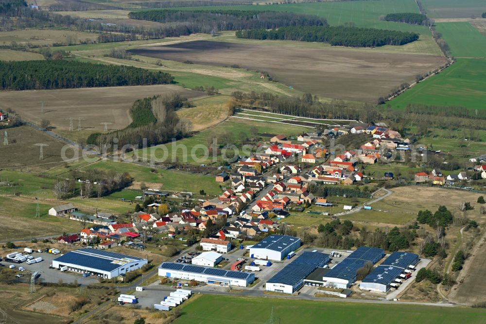 Nunsdorf from above - Warehouses and forwarding building DSS Logistik GmbH on street Dorfstrasse in Nunsdorf in the state Brandenburg, Germany