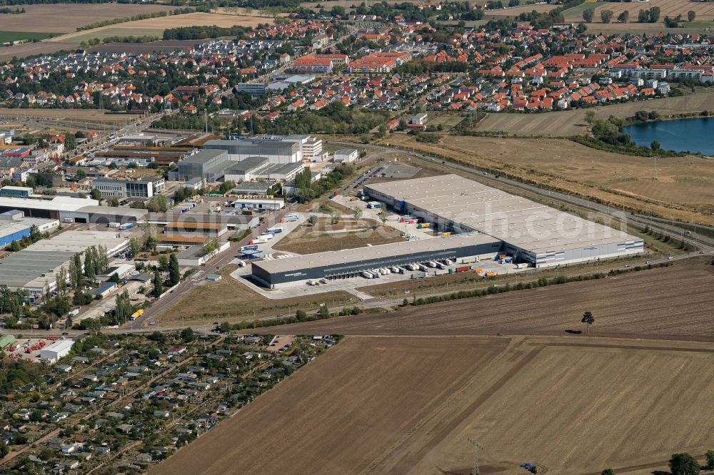 Halle (Saale) from the bird's eye view: Warehouses and forwarding building on Grenzstrasse in the district Bueschdorf in Halle (Saale) in the state Saxony-Anhalt, Germany