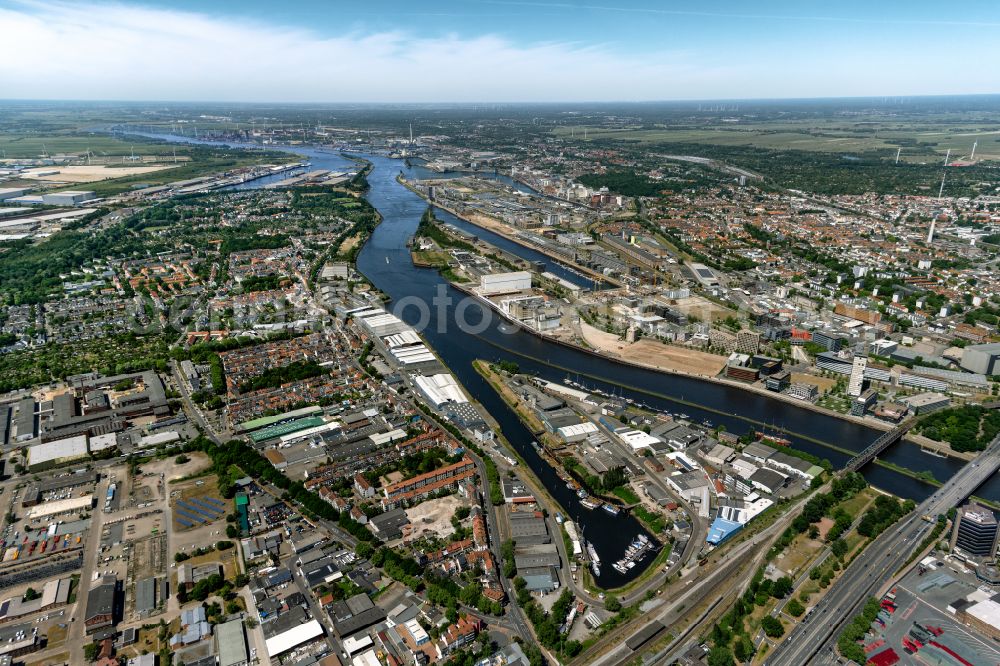 Aerial image Bremen - Warehouses and forwarding building on Weser river in the district Ueberseestadt in Bremen, Germany