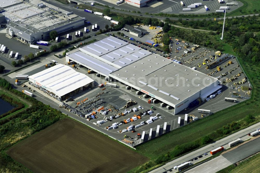 Meineweh from the bird's eye view: Warehouses and forwarding building hagebau Logistik GmbH on Kirchweg in the district Schleinitz in Meineweh in the state Saxony-Anhalt, Germany