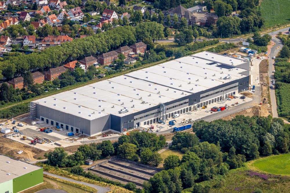 Aerial photograph Kamp-Lintfort - Construction site for a warehouse and forwarding building Alpha Industrial on street Vinnmannsweg in Kamp-Lintfort at Ruhrgebiet in the state North Rhine-Westphalia, Germany