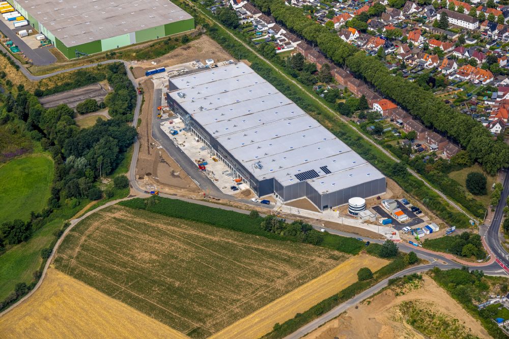 Aerial photograph Kamp-Lintfort - Construction site for a warehouse and forwarding building Alpha Industrial on street Vinnmannsweg in Kamp-Lintfort at Ruhrgebiet in the state North Rhine-Westphalia, Germany
