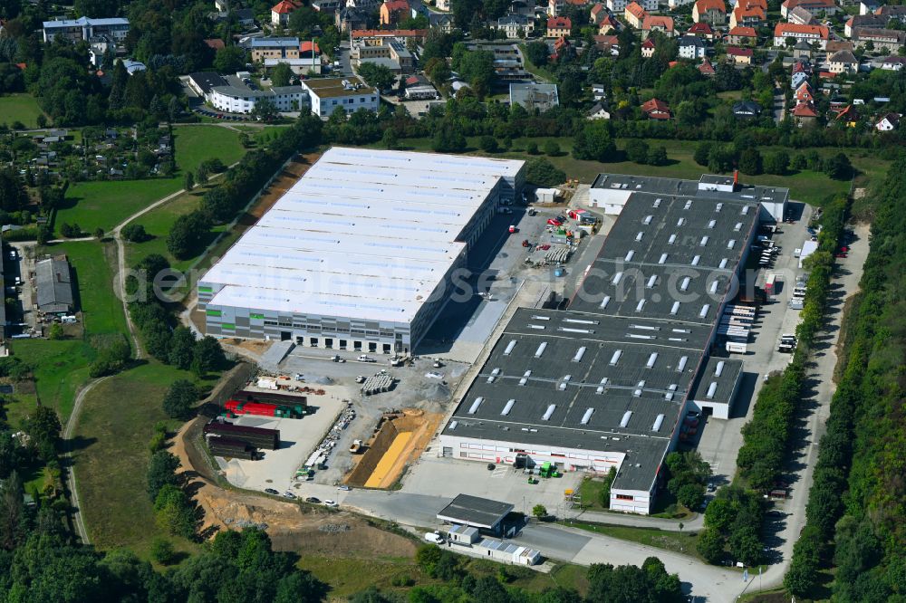 Radeberg from above - Construction site for a warehouse and forwarding building on the former Coca-Cola-Gelaende in Radeberg in the state Saxony, Germany