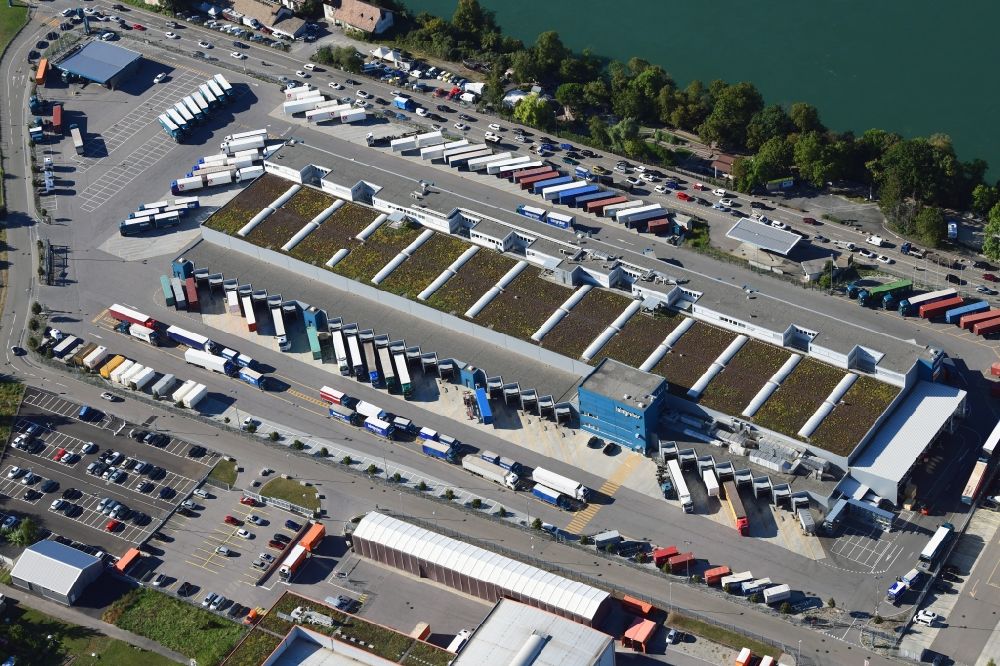 Aerial image Pratteln - Warehouses and forwarding building of logistics company Leimgruber in Pratteln in the canton Basel-Landschaft, Switzerland