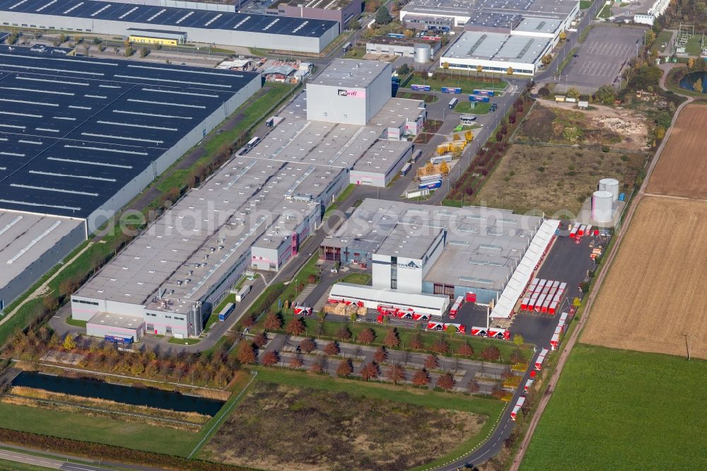 Offenbach an der Queich from the bird's eye view: Warehouses and forwarding building of Tricor Packaging & Logistics AG in Offenbach an der Queich in the state Rhineland-Palatinate, Germany