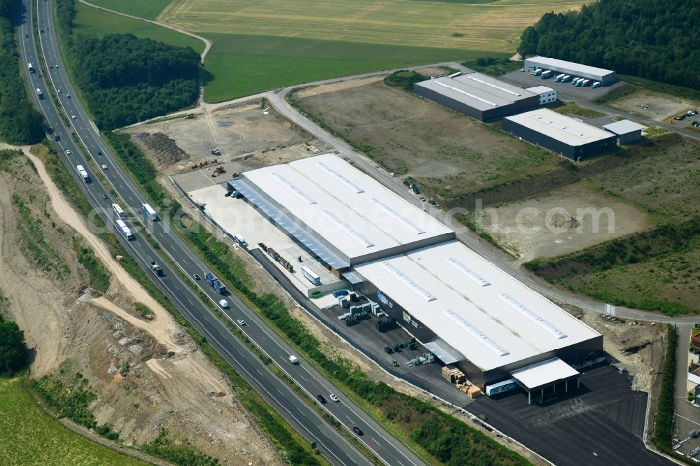 Olpe from the bird's eye view: Construction site for a warehouse and forwarding building on Nicolaus-Otto-Strasse in Olpe in the state North Rhine-Westphalia, Germany