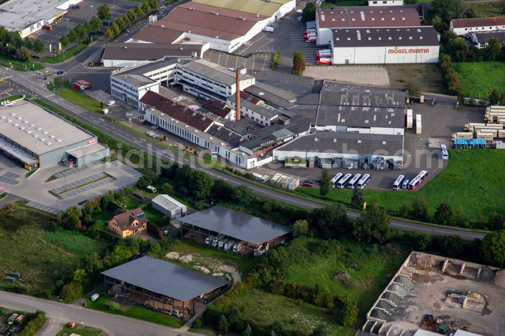 Aerial image Meisenheim - Warehouse complex-building in the industrial area with Ulland Baumaschinen Vermietung & Verkauf in the former building of Reifen.-Maurer on street In der Heimbach in Meisenheim in the state Rhineland-Palatinate, Germany