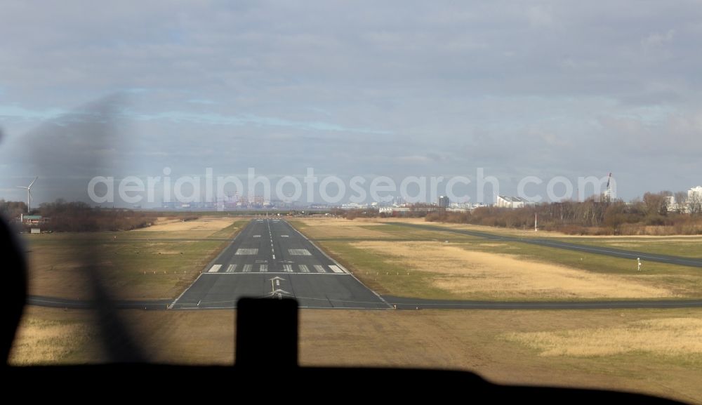 Aerial photograph Bremerhaven - Approaching the runway on the premises of the airport in Bremerhaven few days before the closure and decommissioning of the former commercial airport